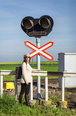 Woman walking along the railway