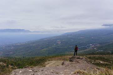 Man standing on rock's edge