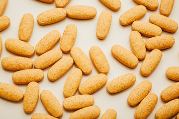 nutrition supplements, orange vitamin pills