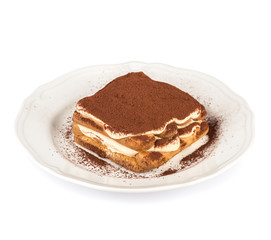 Tiramisu cake in a white plate isolated on white with clipping path