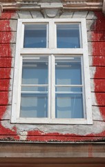 Fototapeta na wymiar Old window in Timisoara, Romania