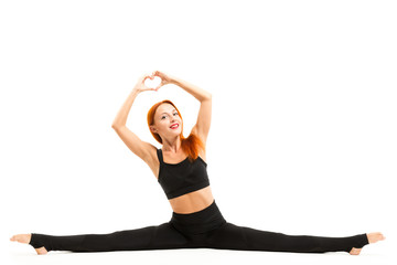 Sporty young woman doing yoga asana