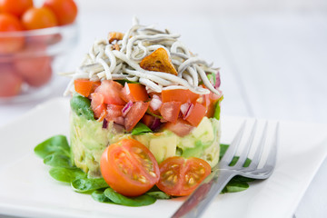 Vegetables and baby eel or elvers tartar 
