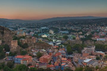 Fototapeta na wymiar Evening view of Tbilisi from Narikala Fortress