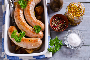 Grilled sausages with potatoes