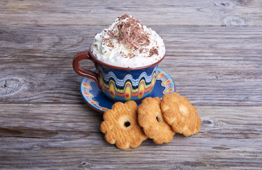 Hot cocoa drink cappuccino with whipped cream