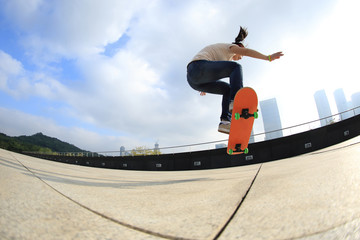 skateboarder skateboarding at city