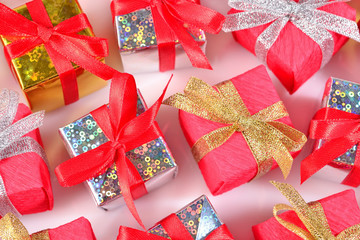 Top view of colorful gifts close-up on a white