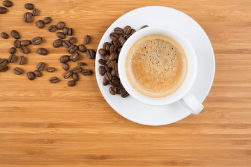 cup of coffee on brown background