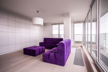 Fototapeta na wymiar Purple and cozy furnitures