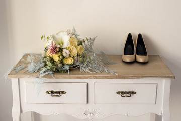 Beautiful wedding bouquet  and shoes