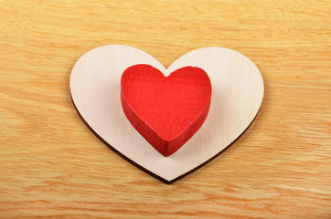 Heart on wooden background