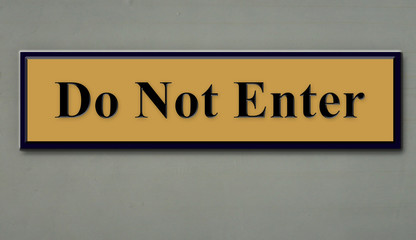 Gold wall sign: Do Not Enter