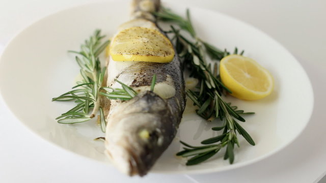 Fish, sea bass, served