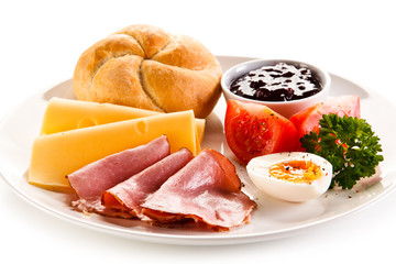 Breakfast - boiled egg, bacon, cheese and vegetables