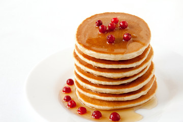 Pancakes with maple syrup and cranberries. Pancake's Day
