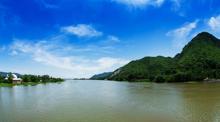 Fototapeta na wymiar River with mountains and sky, Thailand.