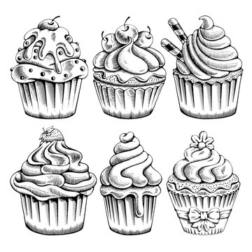 Set of sweet bakery decorated cupcakes hand drawn in vintage engraved style. Vector illustration. Isolated on white background.