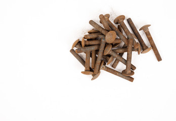 Old rusty bolts isolated on a white background