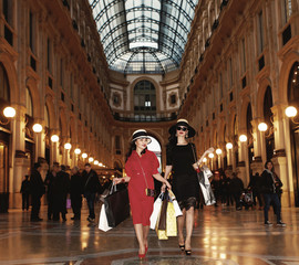 Shopaholics portrait in Galleria Vittorio Emanuele in Milan