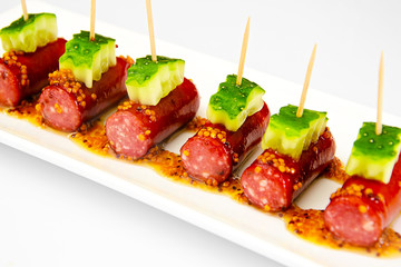 Cocktail Sausage and Cucumber on Plate