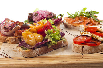 assortment of different types of bruschetta