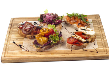 assortment of different types of bruschetta