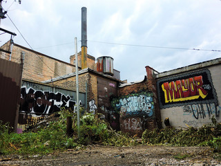 Urban ghetto in the alley with graffiti - landscape photo