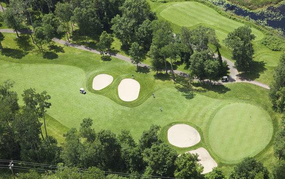 Aerial view of golf course fairway and green