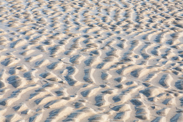 Fototapeta na wymiar Sand ripples at Jacksonville Beach, Florida, USA.