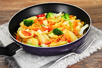 Steamed vegetables potatoes, carrots, corn, green beans, onion