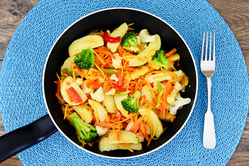 Steamed vegetables potatoes, carrots, corn, green beans, onion