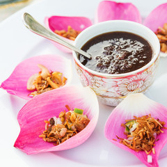 Mix fried rice contained in lotus flower leaf