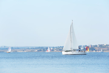 Fototapeta premium Sailing yacht on river