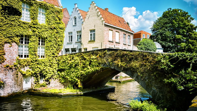 Cityscape with old bridge and typical Flemish houses. Bruges, Belgium. Full HD, 1080p