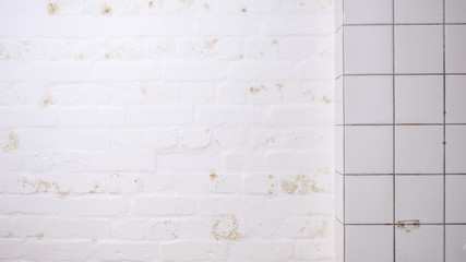 white tiles and brick wall, grunge background