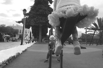 kids on a seesaw