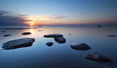 Fototapeta na wymiar Twilight seascape with rocks