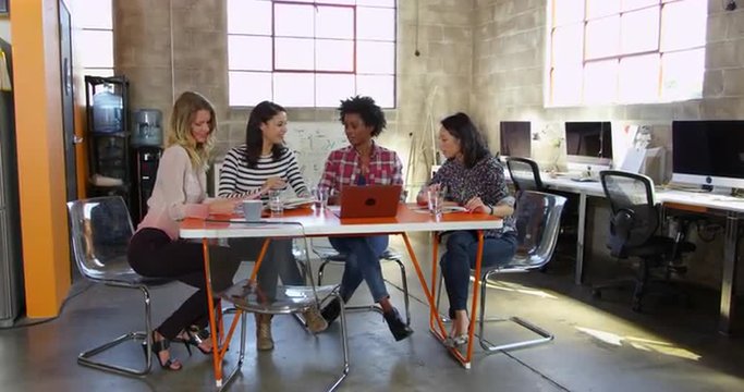 Female Designers Having Meeting In Modern Office Shot On R3D