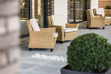 Armchairs open terrace luxury villa exterior