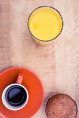 Obraz na płótnie Canvas Juice with coffee and muffin