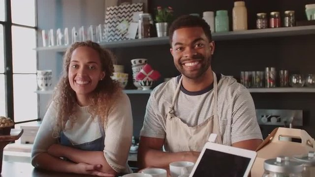 Couple Running Coffee Shop Behind Counter Shot On R3D