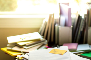 By Tomorrow Morning; Stack of Documents. Working or Studying at