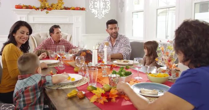 Family Enjoying Thanksgiving Meal At Table Shot On R3D