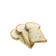 Stack of moldy bread isolated on white background