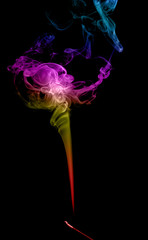 Abstract multicolored smoke on a dark background