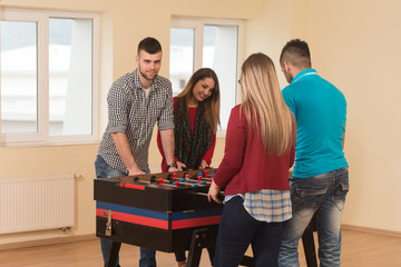 Friends Playing Soccer Table - Foosball