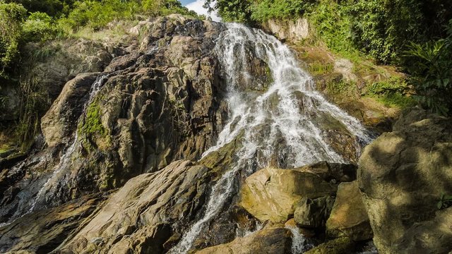 Tropical waterfall in rocks

