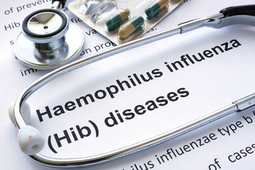 Paper with diagnosis Haemophilus influenza  (Hib) diseases and stethoscope.