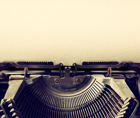 close up image of typewriter with paper sheet. copy space for your text. terto filtered
